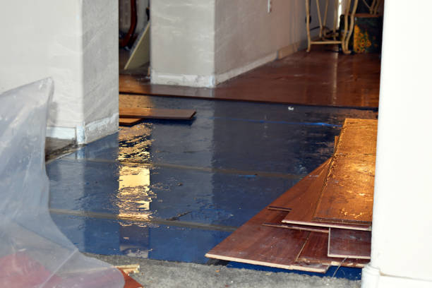 Professional Emergency Water Damage Restoration technician working in Uxbridge, MA